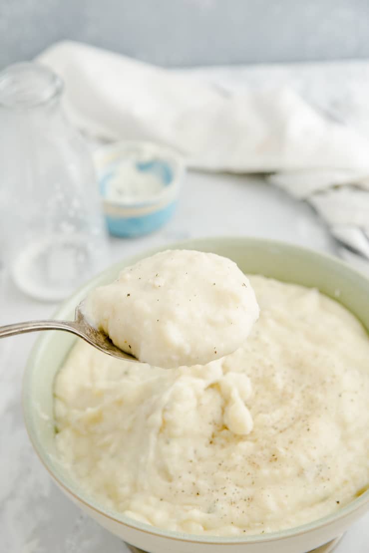 spoon serving mashed potatoes
