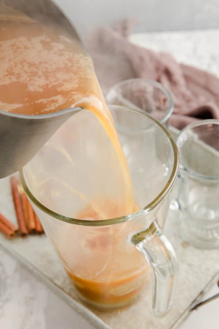 hot cider poured into a pitcher