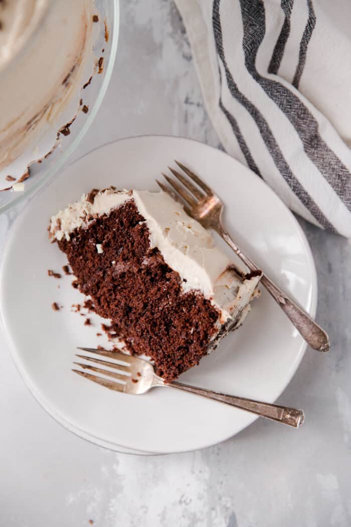 slice of chocolate cake with two forks