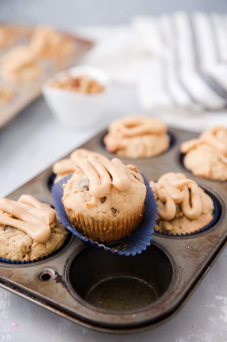 one banana muffin in a blue paper cup