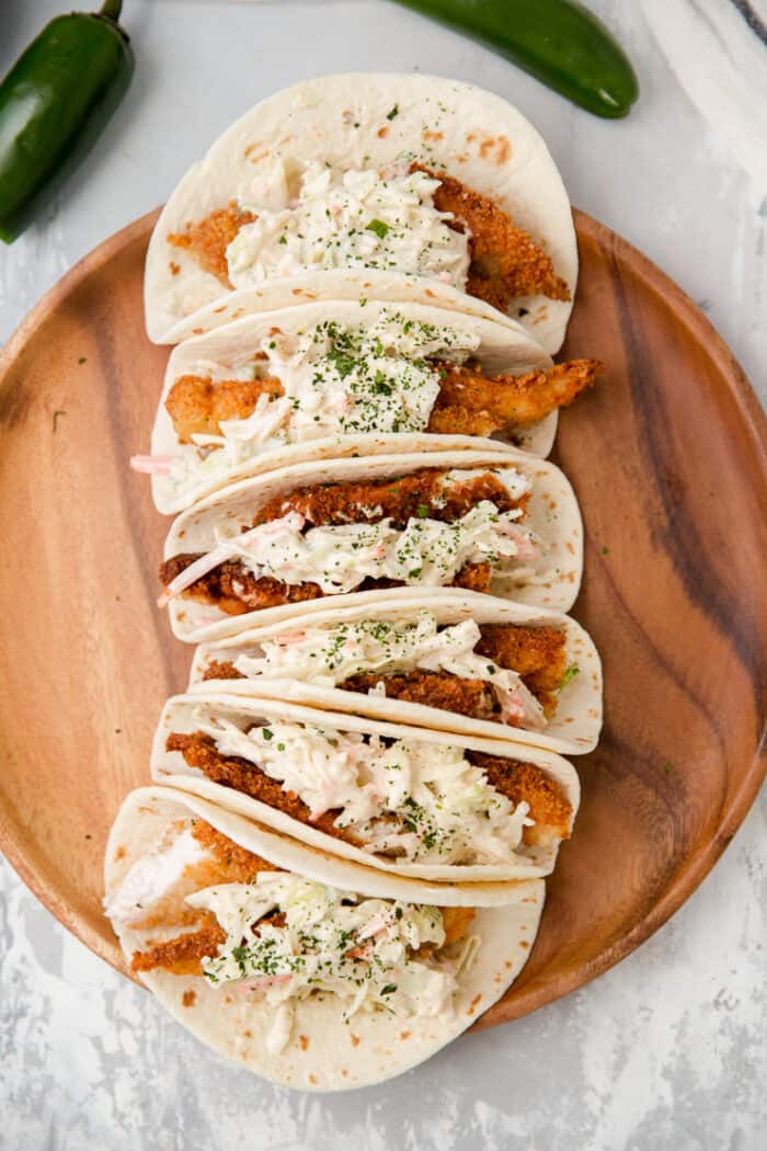 fish tacos lined up vertically
