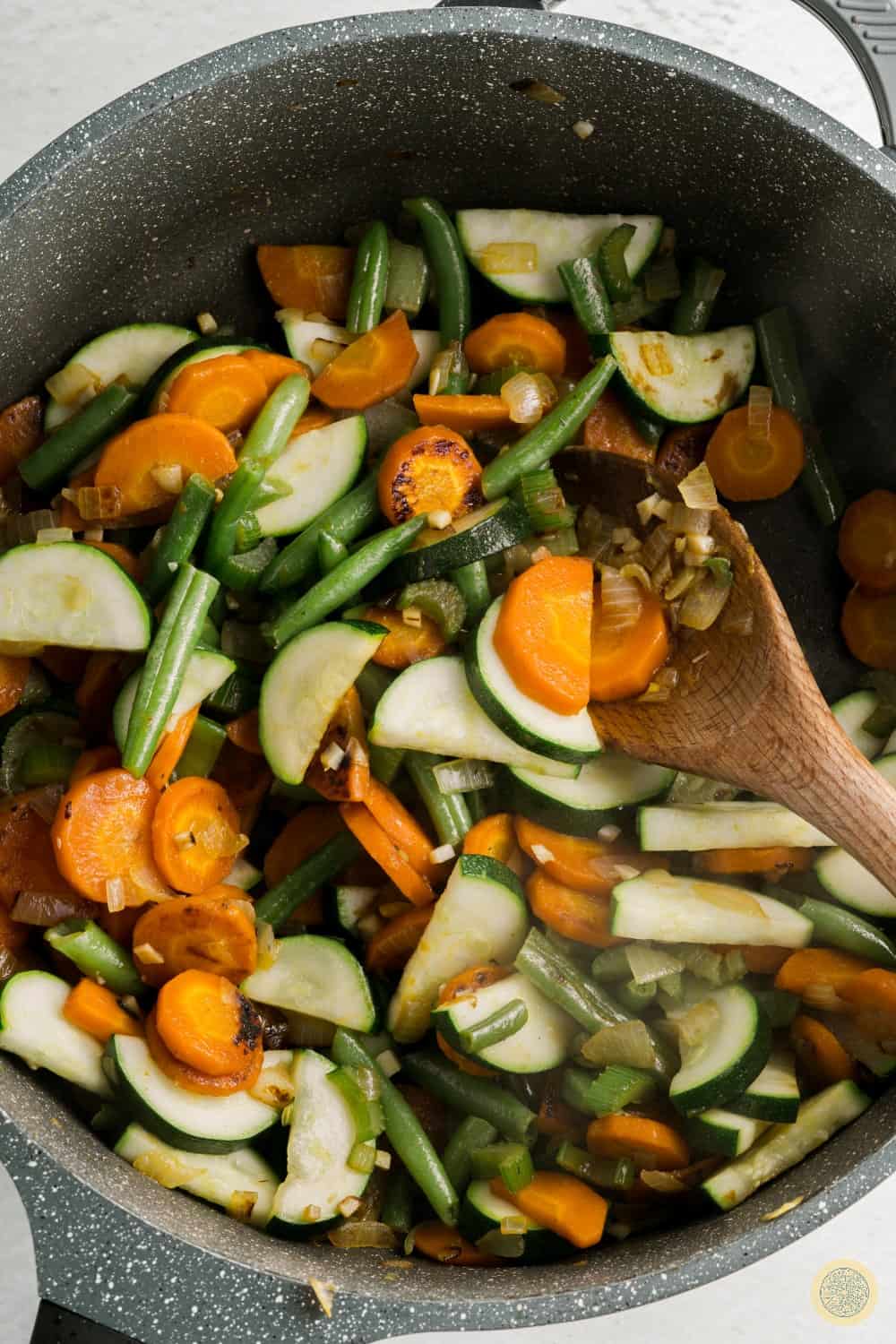 Chop your zucchini for minestrone soup