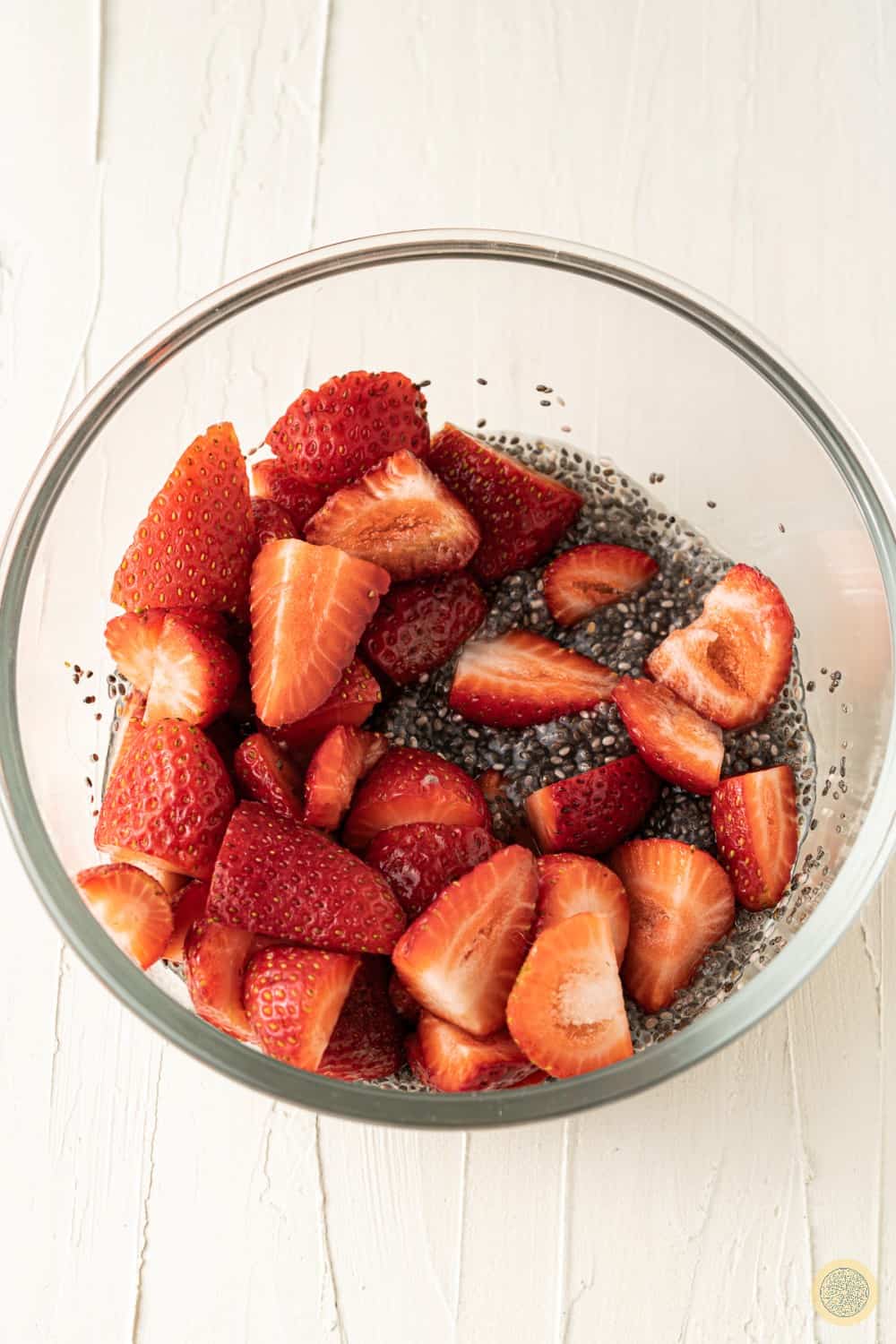 Add chia seeds and the strawberry