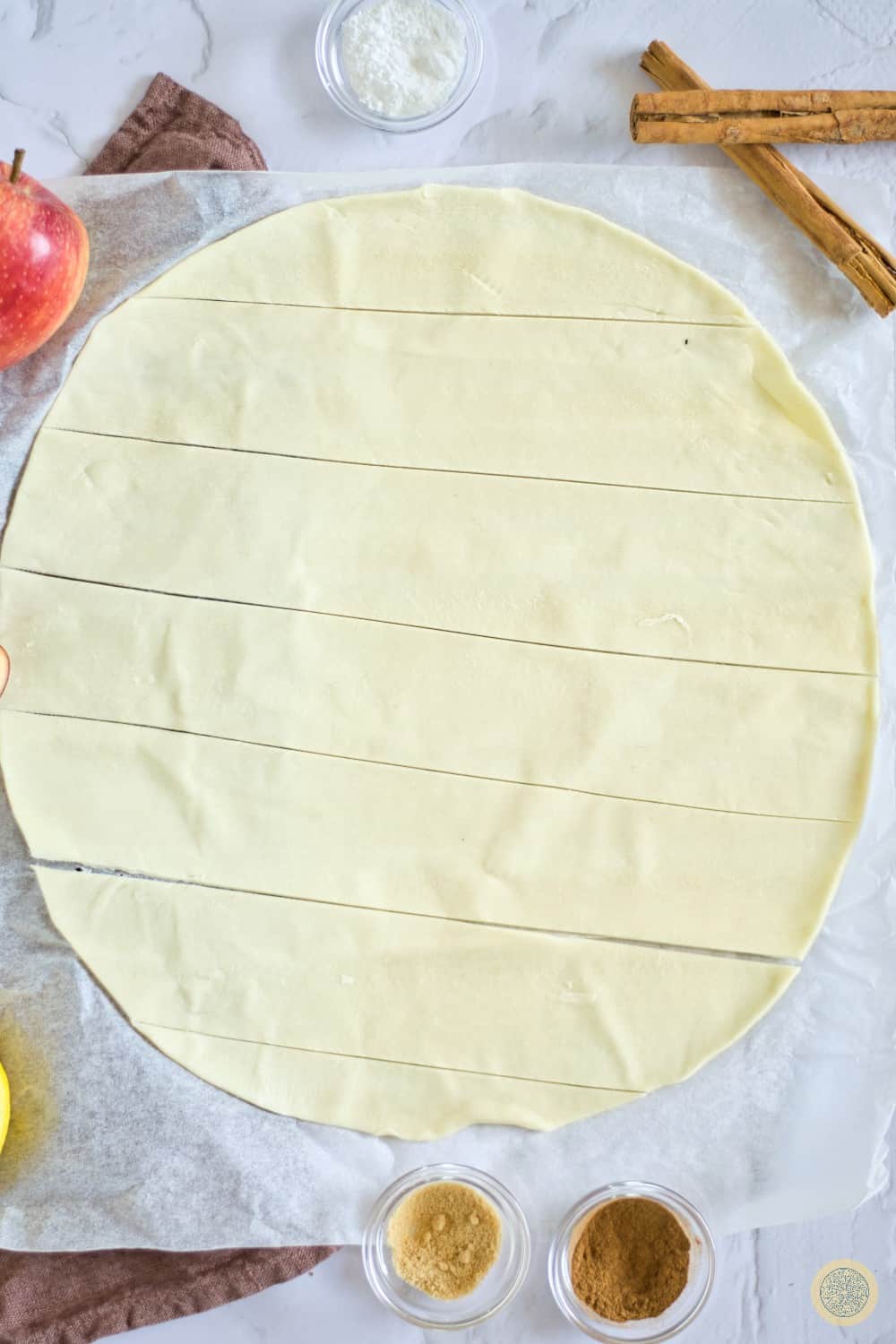 Unwrap your thawed puff pastry and place it onto a cleaned surface.