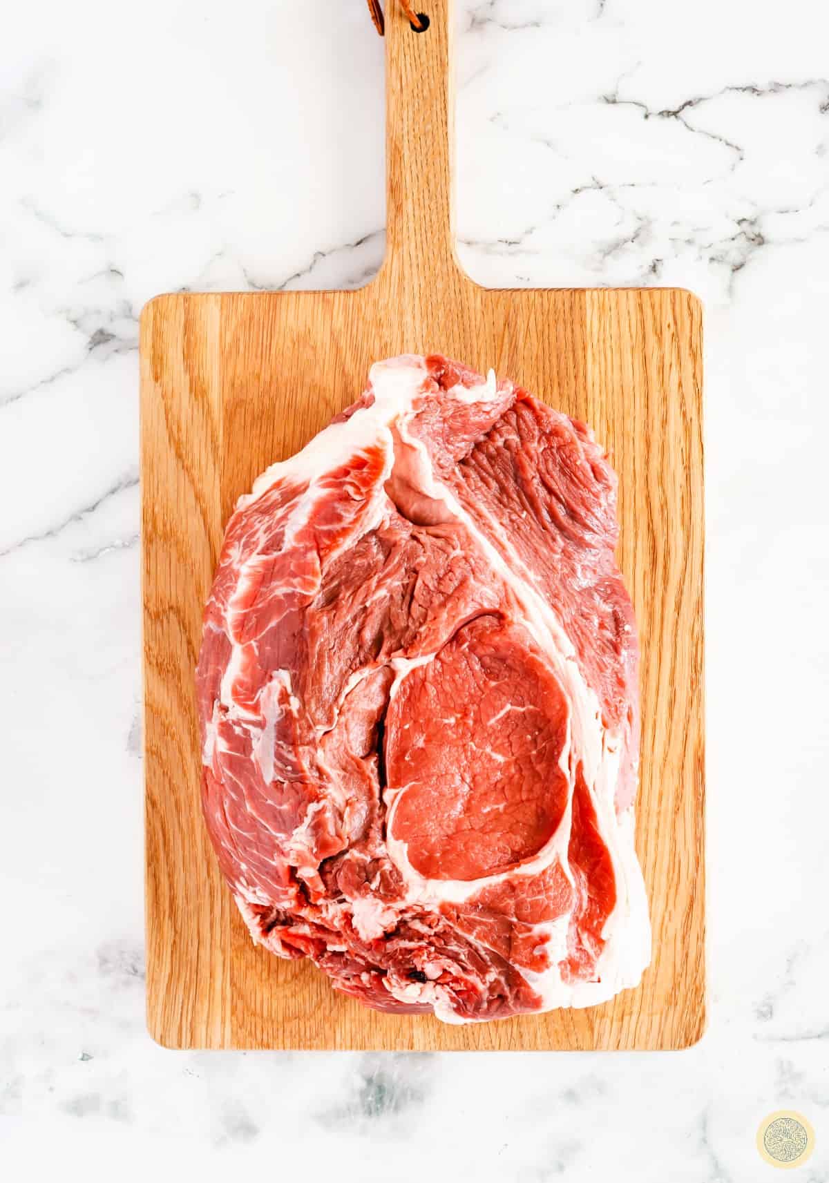 Trim off the excess fats from your beef and slice