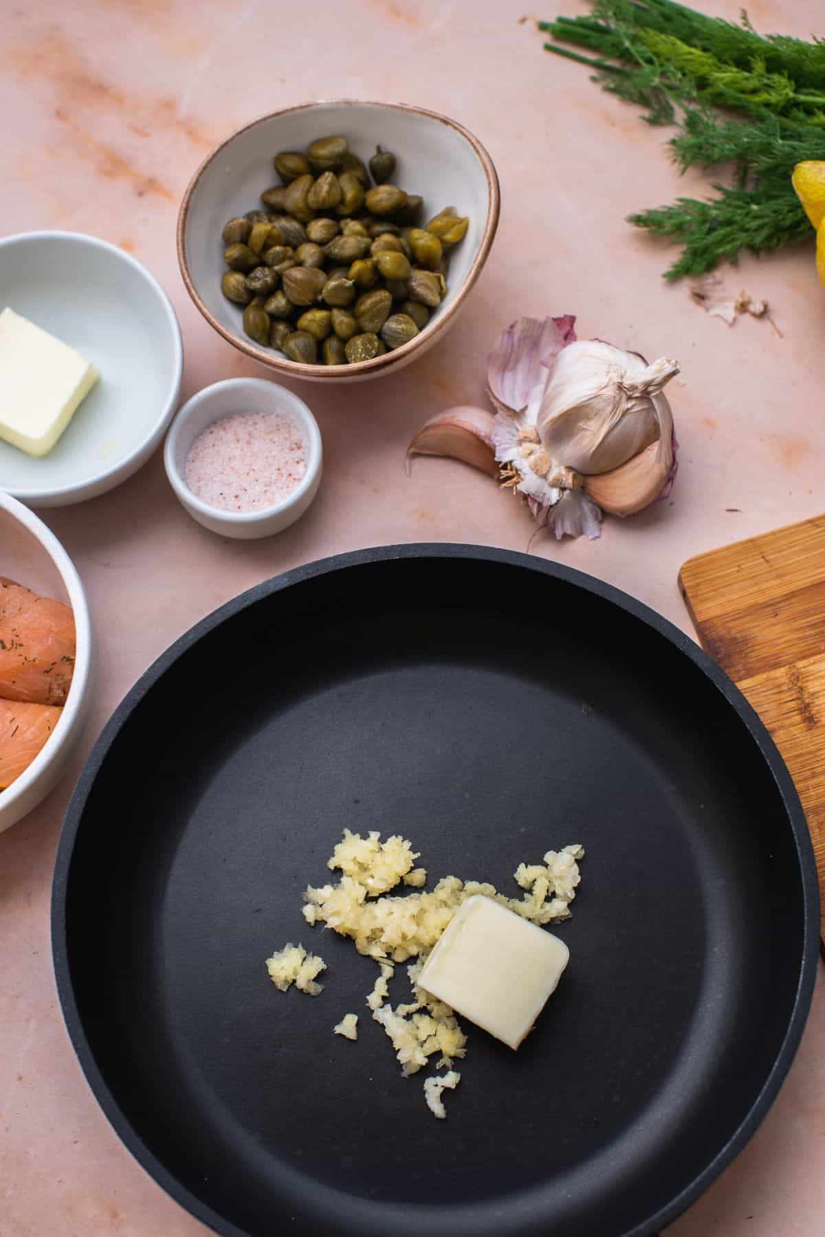 melt butter and garlic in pan