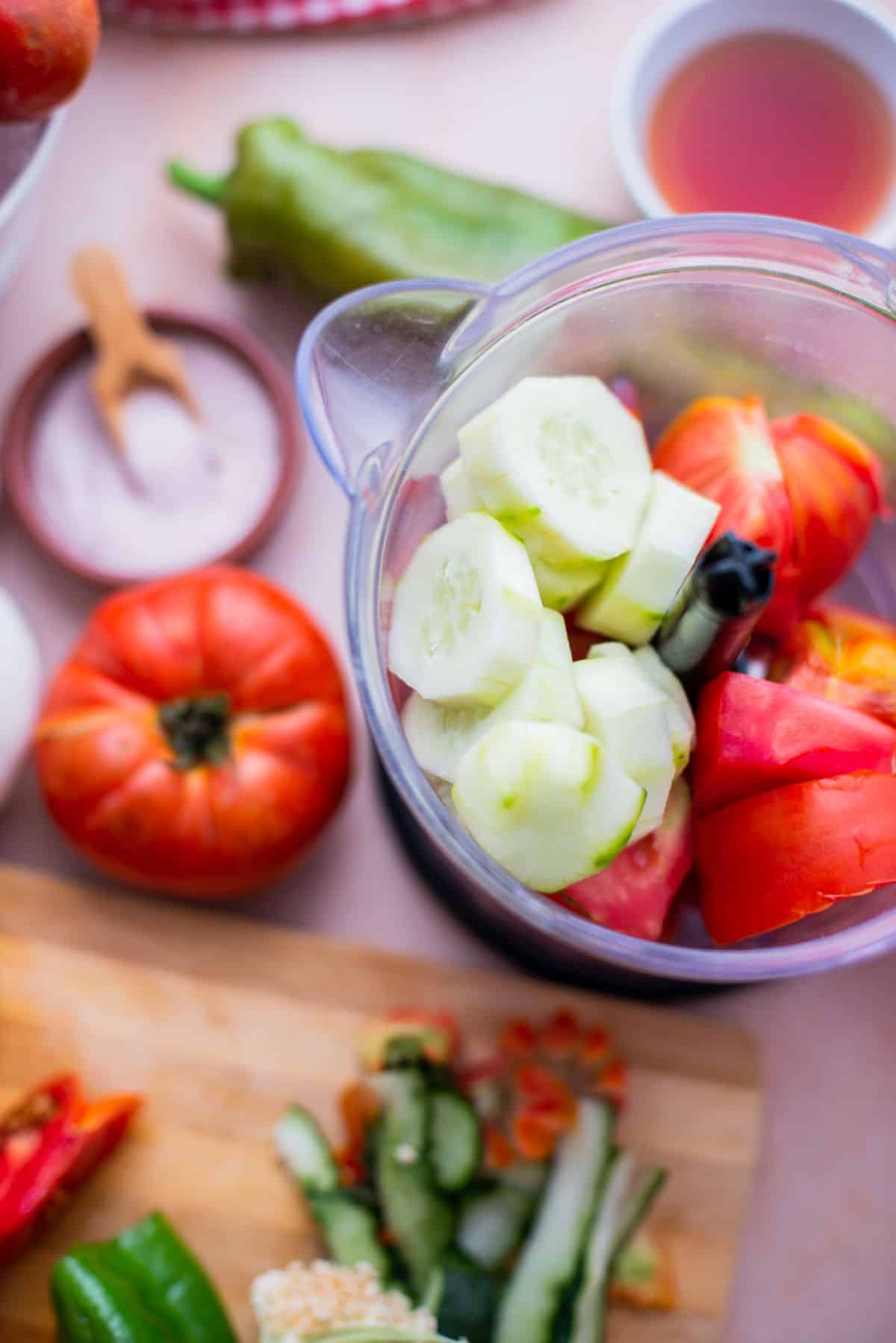 chopped cucumber and tomato in a food processor