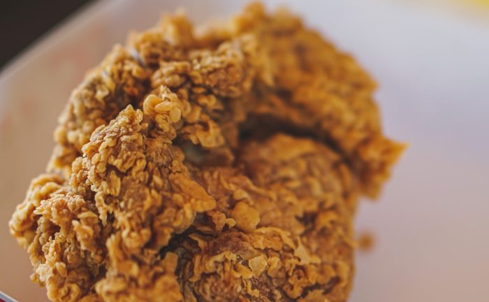 Crushed saltine crackers create a thick, craggy coating for fried chicken. Leave some larger crumbs for extra crunch and season with care.